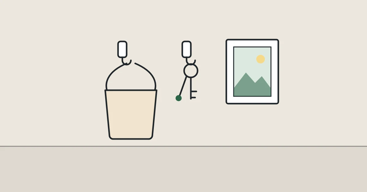 Illustration of adhesive hooks on a wall holding a bag, keys and a framed picture